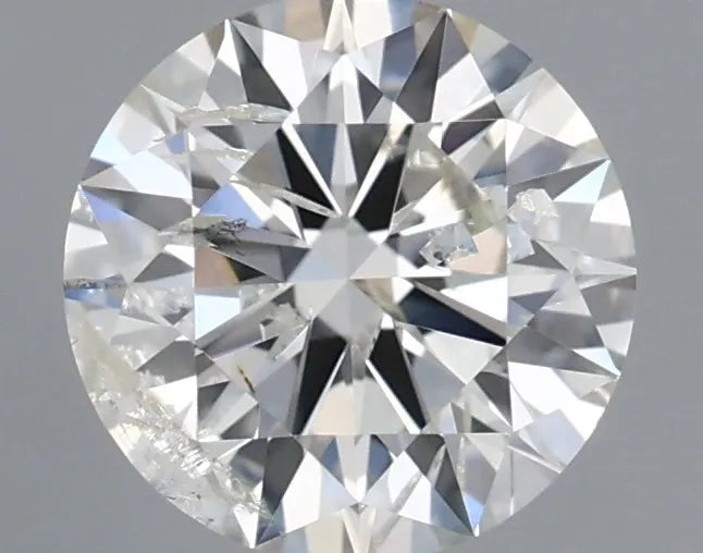 0.61ct Round Natural Diamond (Colour H, Clarity I1, Cut EX, IGI Certified)