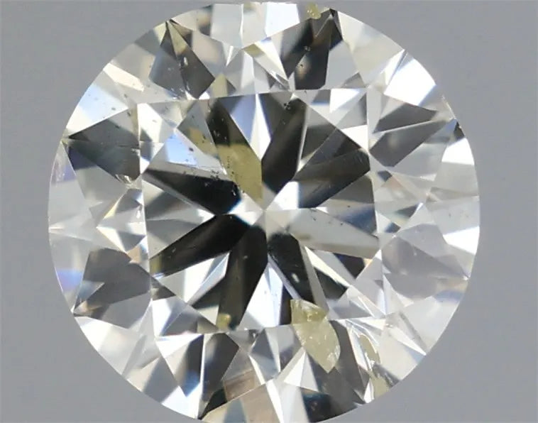 0.70ct Round Natural Diamond (Colour K, Clarity I1, Cut GD, IGI Certified)