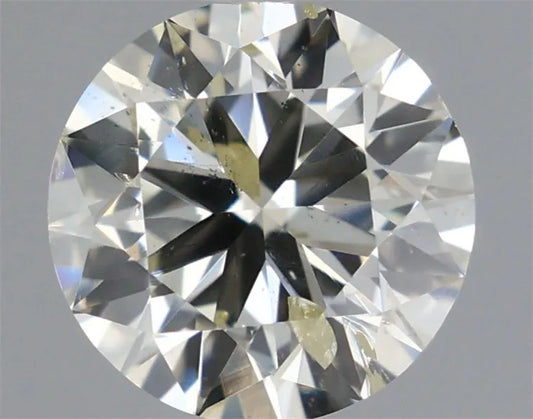 0.70ct Round Natural Diamond (Colour K, Clarity I1, Cut GD, IGI Certified)